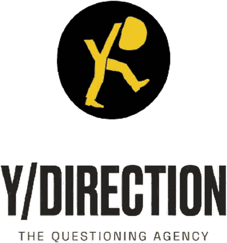 Y/DIRECTION — the yellow walking figure on a black disc, above the wordmark and the line “the questioning agency”.
